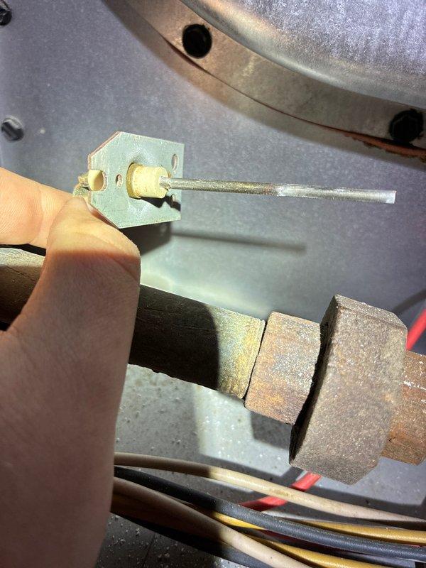 Performed standard maintenance on Goodman furnace system. Inspected flame sensor and cleaned component to ensure proper operation. Visual inspection of all ductwork connections, gas lines, and electrical wiring confirmed system is functioning correctly with no visible issues.