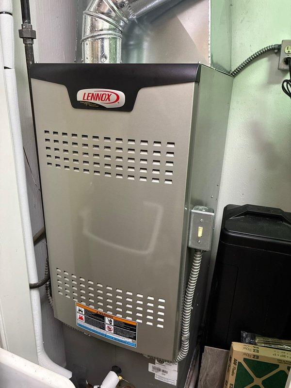 Performed comprehensive maintenance tune-up on Lennox furnace located in utility closet. Inspected all components including heat exchanger, burners, and electrical connections. System is operating within normal parameters with proper airflow through ductwork and no signs of damage or anomalies detected.