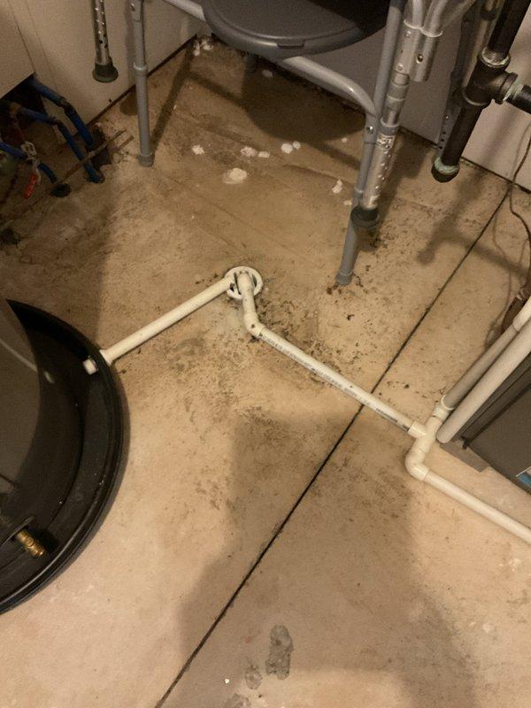 Responded to service call for multiple clogged drains affecting laundry sink, shower, and toilet in back room. Conducted thorough inspection of drainage system and discovered blockage in main drain line. Successfully cleared obstruction using professional-grade equipment, restoring proper drainage function to all affected fixtures and confirming proper water flow throughout the system.