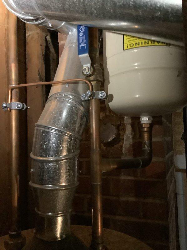 Responded to service call for recurring kitchen sink drain clog with additional drainage issues reported in basement. Inspection revealed aging P-trap with significant corrosion and mineral buildup in connected drain lines. Successfully cleared the immediate clog and recommended replacement of deteriorated plumbing components to prevent future blockages.