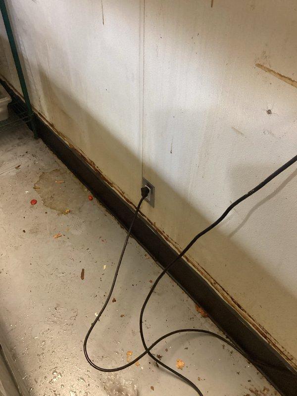 Responded to service call at commercial restaurant to replace deteriorated electrical outlet in utility area. Disconnected power, removed damaged receptacle, and installed new commercial-grade outlet suitable for food service environment. Tested installation with equipment power cord to verify proper operation and safety compliance before restoring service.