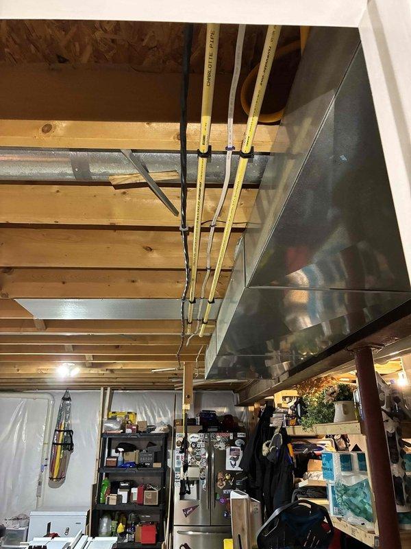Installed dedicated circuit for hot tub, routing power from outdoor pool panel using 1-inch metallic sealtite conduit. Ran wiring through basement cavity near AC line set to reach hot tub location, maintaining required 5-6 foot clearance between spa disconnect and internal spa components. Connected whip from disconnect to control panel, completing installation per electrical code requirements.