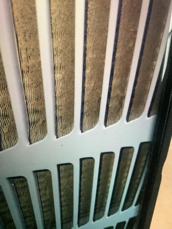 Performed routine maintenance service on cooling system for MVP customer. Inspected evaporator coils which showed moderate dust accumulation on heat exchange surfaces. Examined air filter which displayed significant dirt buildup in pleated media, indicating timely replacement was necessary to maintain system efficiency and proper airflow.