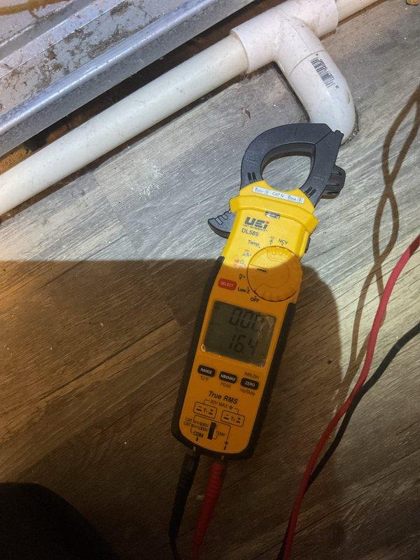 Performed scheduled maintenance on aging heating system (10+ years old). Conducted electrical diagnostics using UEI DL429 clamp meter, recording current readings of 0.84A and 15.4V. System functioning within normal parameters following inspection.