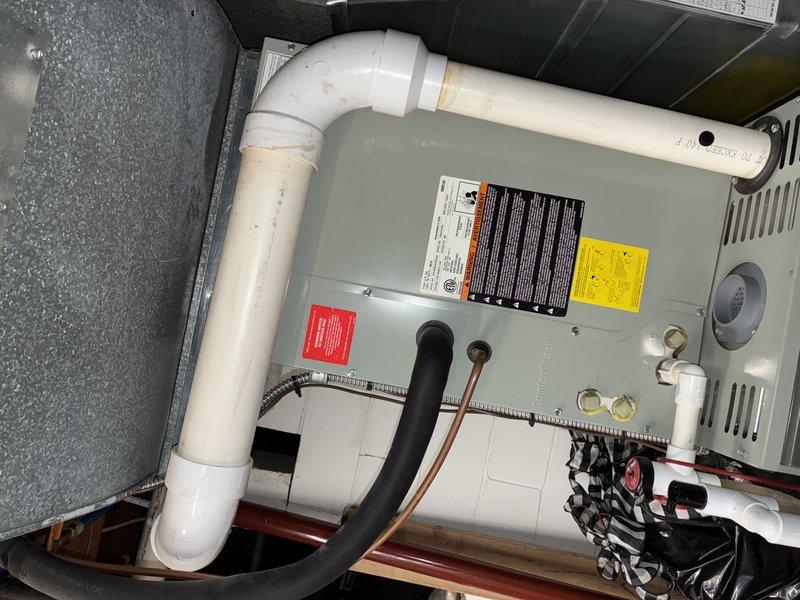Completed routine MVP heating maintenance service. Inspected furnace unit and associated components including PVC exhaust, copper lines, and connections. Checked PROFLO shutoff valve for proper operation and verified no signs of leakage at threaded connections.