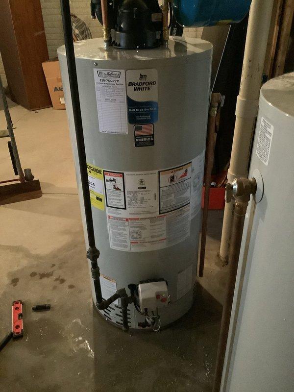 Successfully installed a new 50-gallon Bradford White power vent water heater with a 6-year warranty in the customer's utility area. Installation included proper connection of copper and PVC piping, installation of an expansion tank, and complete system testing to ensure optimal functionality. All old equipment was removed and the new unit is operating according to manufacturer specifications.