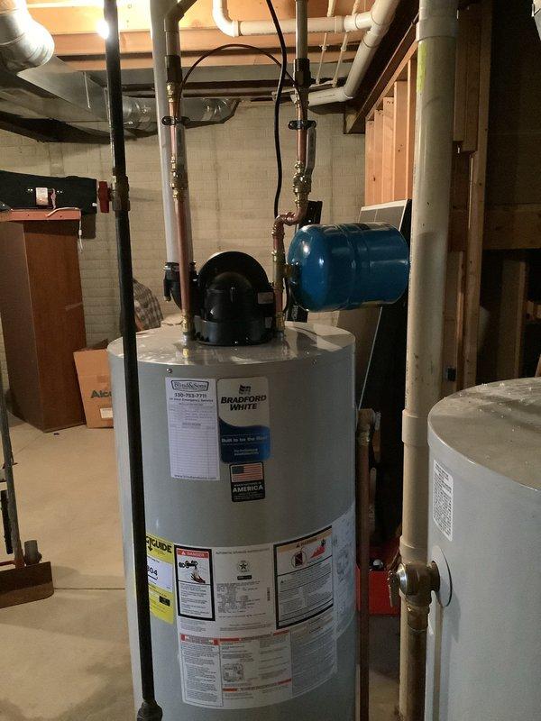 Successfully installed a new 50-gallon Bradford White power vent water heater with a 6-year warranty in the customer's utility area. Installation included proper connection of copper and PVC piping, installation of an expansion tank, and complete system testing to ensure optimal functionality. All old equipment was removed and the new unit is operating according to manufacturer specifications.