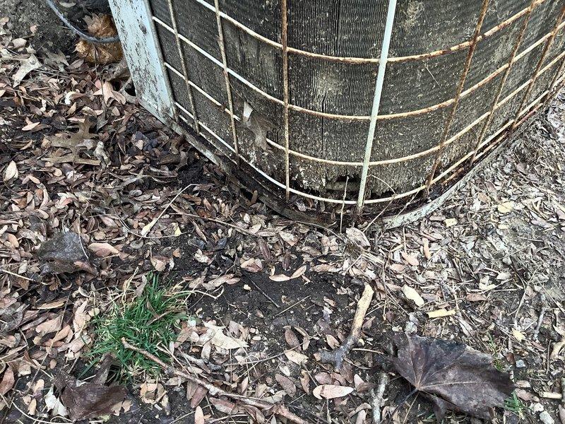Performed scheduled maintenance on Kenmore outdoor air conditioning condenser unit. Observed significant dirt accumulation, debris, and corrosion on exterior components including protective grilles and housing. Documented condition with photos for service record.
