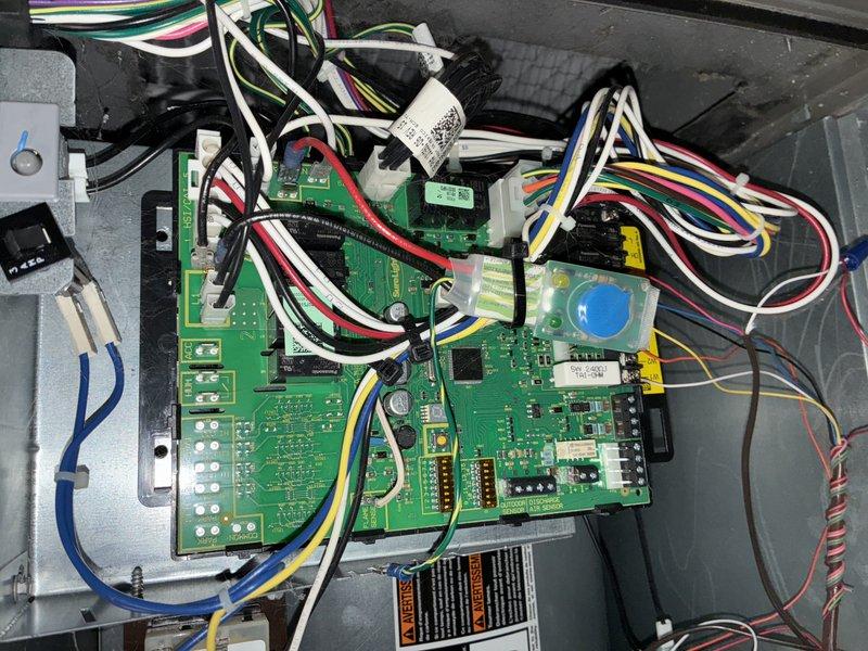 Performed routine AC maintenance for MVP customer, inspecting control board connections and verifying proper wire terminations on PCB. Cleaned and examined blower wheel assembly, noting all components in good working condition with no signs of significant wear or electrical issues.
