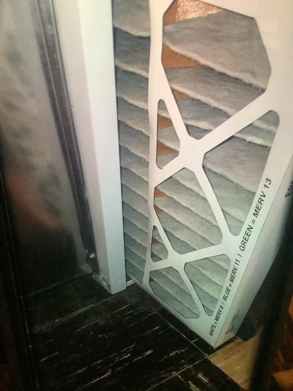 Performed routine maintenance on furnace system. Inspected and replaced MERV 13 air filter which showed moderate dust accumulation. Examined ECM control board (24VAC) and associated wiring harness connections for proper function, noting all components were operational with no visible defects.