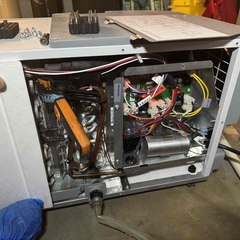 Performed diagnostic service on a 3-year-old whole house dehumidifier located in the basement utility room. Inspected internal components including copper coils, circuit board connections, and control panel functionality, then cleaned and tested the unit to restore proper operation.