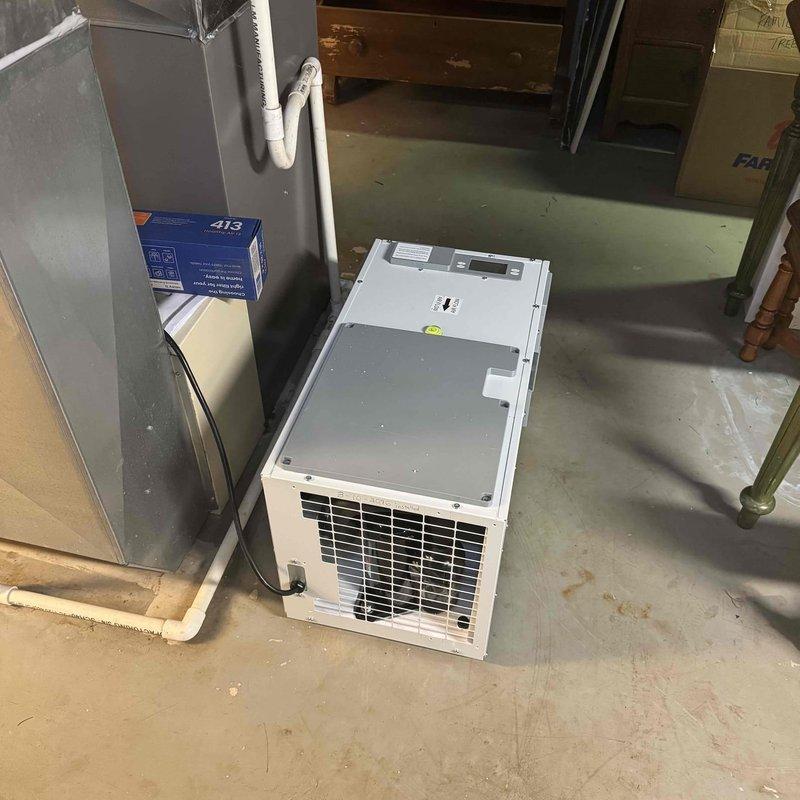 Performed diagnostic service on a 3-year-old whole house dehumidifier located in the basement utility room. Inspected internal components including copper coils, circuit board connections, and control panel functionality, then cleaned and tested the unit to restore proper operation.