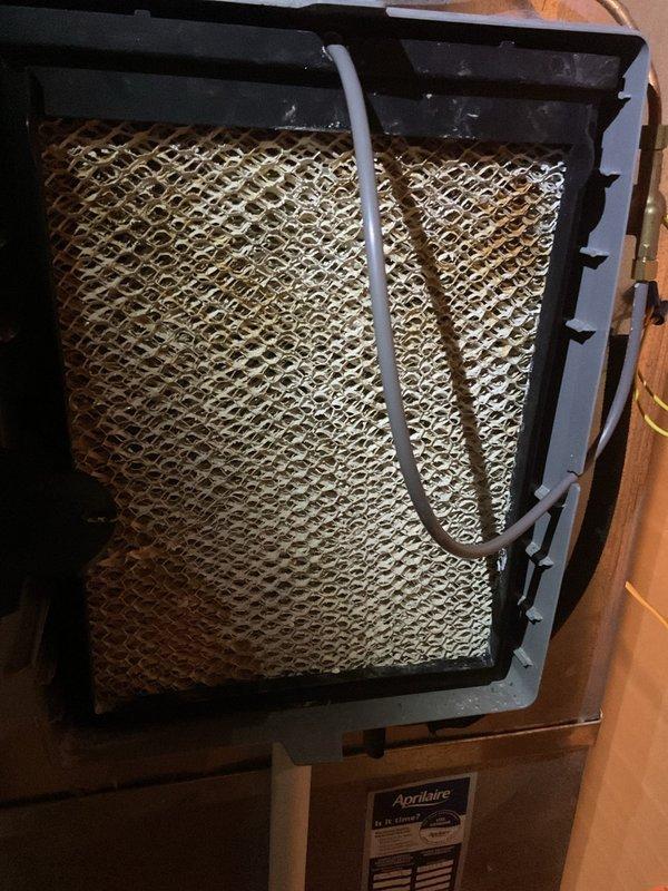 Performed MVP furnace maintenance service including inspection of humidifier components. Replaced Aprilaire humidifier filter panel and verified proper water distribution through supply tube. All maintenance tasks completed using appropriate tools to ensure optimal heating system performance for the upcoming season.