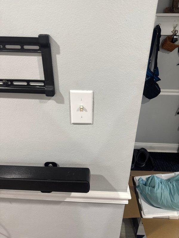 Successfully installed a new ceiling fan with fan-rated box in the living room, utilizing the existing switch located behind the television. Confirmed proper electrical connections and verified fan operation before completing the job.