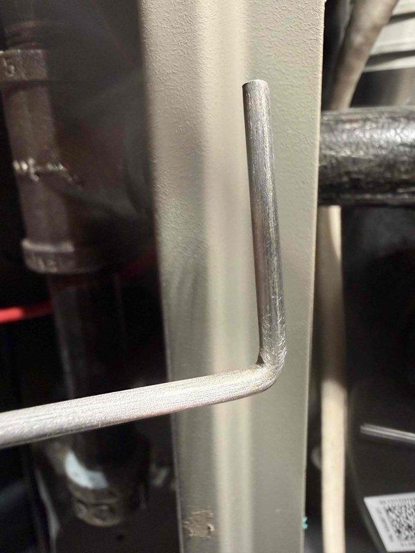 Performed scheduled MVP Heating maintenance visit. Inspected HVAC system components including filter dated 1-25-24 (expiration 2026) and verified proper installation. Examined mechanical components including L-shaped metal rod and connecting pipes, confirming all parts in normal working condition with no visible damage or corrosion.