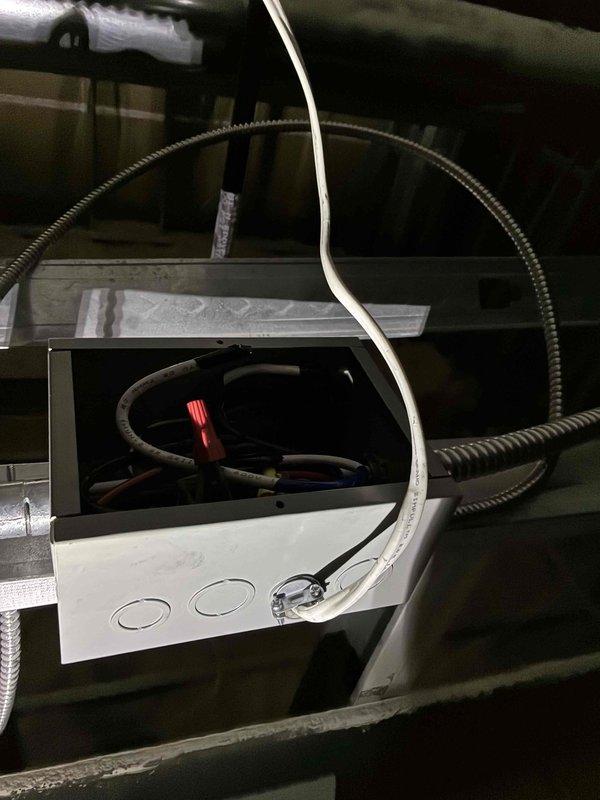 Relocated faulty sauna contractor to an accessible location and re-ran romex wiring to the heater. Inspected electrical junction box and 30A circuit breaker, replacing damaged components and securing connections with wire caps to ensure safe operation of the system.