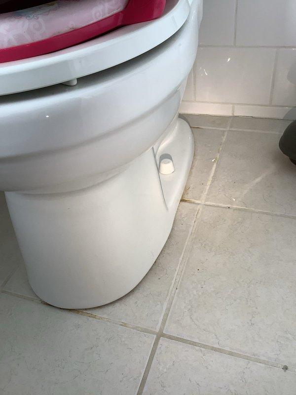 Identified and repaired toilet leak that was previously overlooked, which was causing water to drip into basement electrical box. Inspected toilet base and supply line connection, replaced faulty wax ring and tightened loose fittings to ensure proper seal and eliminate water seepage.