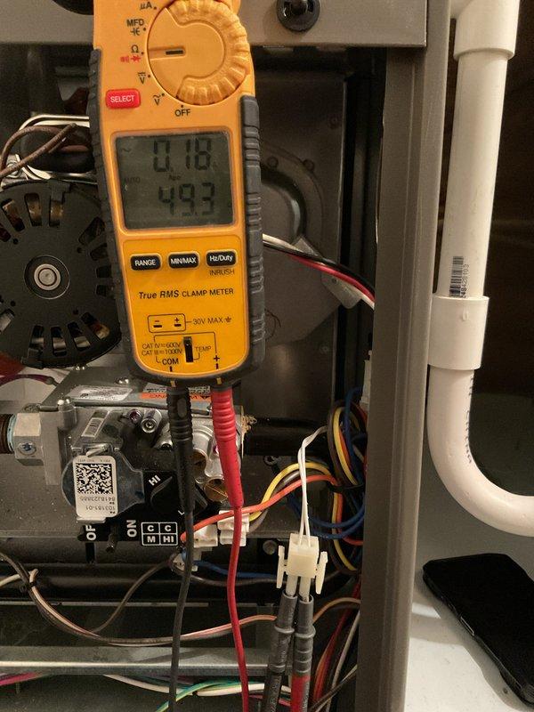 Performed scheduled maintenance on gas furnace as part of recurring MVP Heating service. Inspected gas line and verified proper positioning of shutoff valve. Conducted electrical diagnostic testing with clamp meter, measuring current draw (0.18A) and voltage (49.3V) across motor components and control board to ensure system is operating within manufacturer specifications.