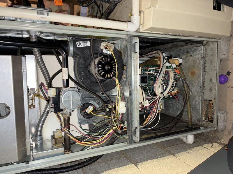 Responded to service call for a furnace producing loud buzzing noise during operation. Upon inspection, removed front panel to access internal components and examined blower motor assembly. Discovered dust accumulation on blower wheel causing imbalance; thoroughly cleaned blower wheel and checked all electrical connections to eliminate noise issue. System now operating normally with proper airflow and significantly reduced noise levels.