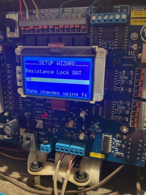 Completed replacement of the defective zone control panel with a new unit. Installed and configured the replacement panel, including setting up the HP LAT High Limit (120°) and Resistance Lock OAT parameters through the setup wizard. System is now operational with proper zoning functionality restored.