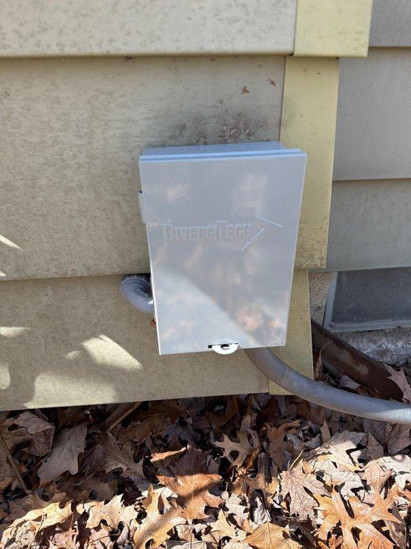 Completed installation of 80% FRN furnace and AC system with new fused disconnect. Mounted DiversiTech junction box on exterior wall and installed appropriate Littelfuse cartridge fuses for proper circuit protection of the outdoor condensing unit.