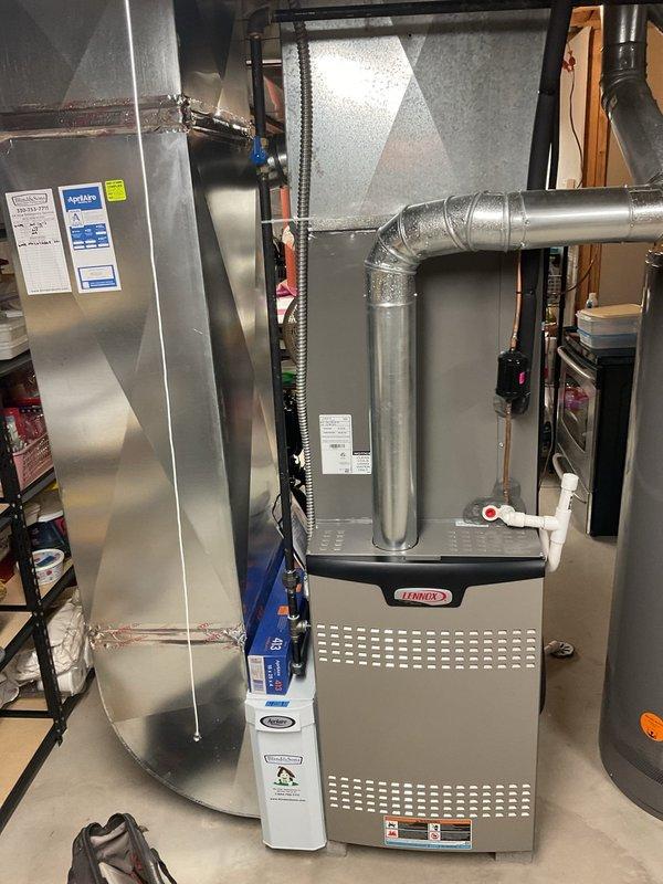 Performed scheduled MVP heating maintenance on Lennox furnace system. Conducted comprehensive inspection of furnace unit, including examination of ductwork connections, ventilation system, and condensate drainage components. All systems functioning properly with no issues identified; unit appears well-maintained with secure connections throughout.