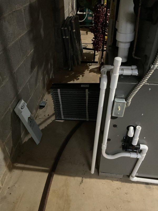 Completed routine MVP heating maintenance service in basement utility area. Inspected furnace system including ductwork, PVC venting, electrical connections, and heat exchanger components for proper operation. Verified control panel functionality and confirmed system is operating within normal parameters.