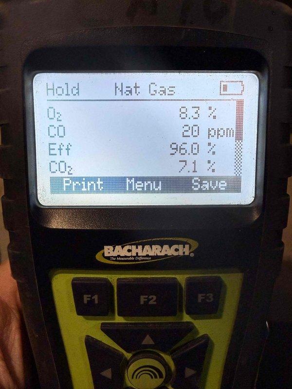 Performed combustion analysis on gas heating system with Bacharach analyzer confirming 96.0% efficiency with acceptable CO readings (20 ppm). Replaced failing igniter as preventative measure and completed blower wheel cleaning to improve air quality and system performance. Verified proper operation of ventilation components following service.
