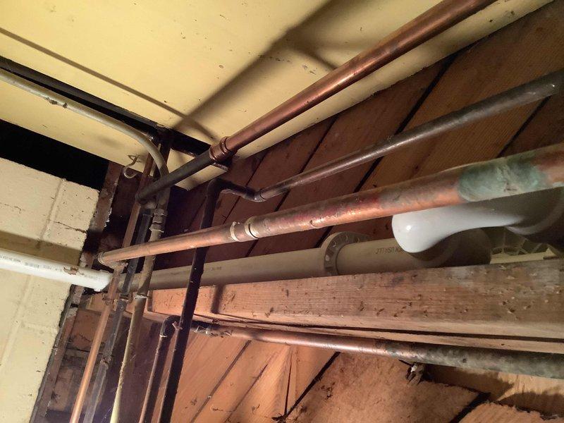Completed replacement of deteriorated cast iron stack and horizontal run, including tub trap and waste/overflow assembly on first floor. Installed new PVC-DWV drainage system with 2" stack clean-out and brushed nickel trim for the tub waste and overflow. Prior to replacement, performed drain snaking service and removed corroded overflow plate to provide temporary relief.