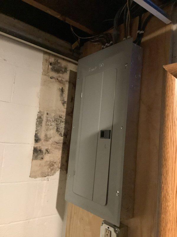 Responded to failed electrical inspection by properly labeling the meter main outside and interior electrical panel. Addressed workspace clearance issues in front of the existing panel located in closet and installed required emergency disconnect stickers as specified in the inspection report.