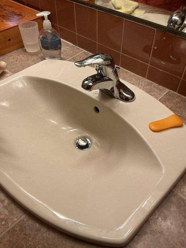 Completed replacement of bathroom lavatory faucet with customer-provided parts. Verified proper installation with no leaks at connections and confirmed full functionality of new fixture. System operating as designed with appropriate water flow and drainage.