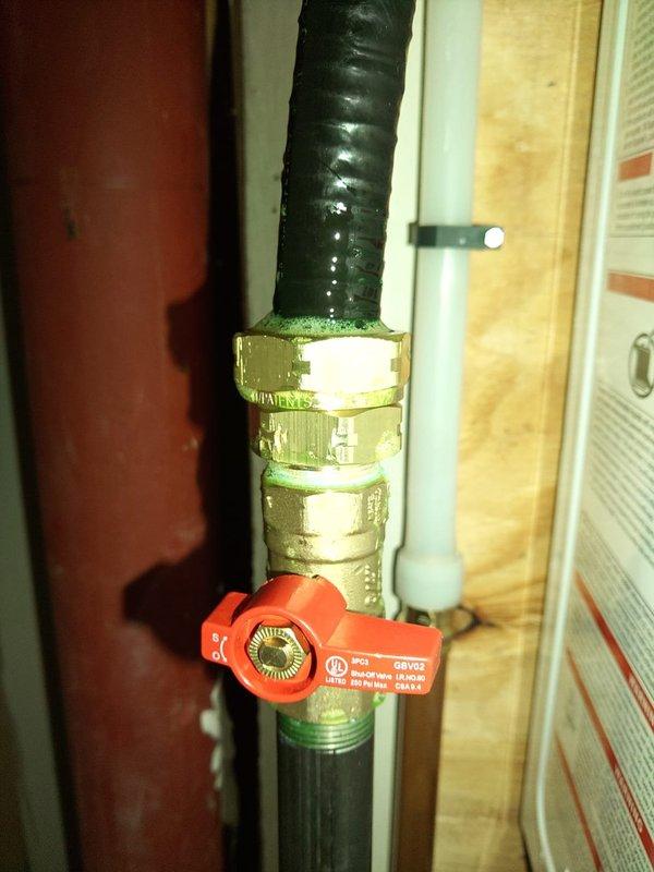 Completed installation of a Navien NPE tankless water heater to replace the existing 50-gallon Rheem power vent unit. Mounted panel board, connected to existing water and gas lines, and installed fresh air intake to current PVC exhaust pipe. Added required access panels in soffit for strapping and fitting access, with exhaust routed through soffit and exiting the rear of the house east of the outside faucet.
