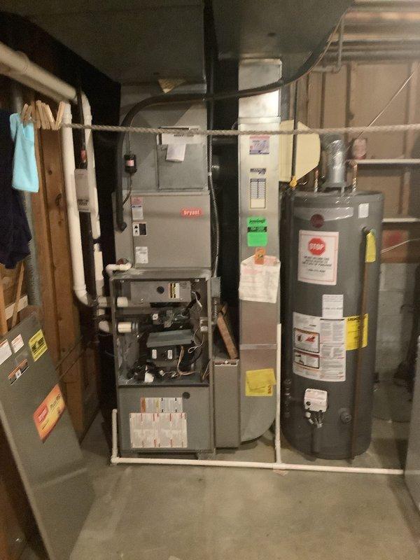 Successfully completed installation of a 90% efficient furnace with air conditioning system, including humidifier and Air Scrubber 2410 air purification system. Existing Bryant condenser was retained, and customer's personal thermostat was integrated with the new system as requested.