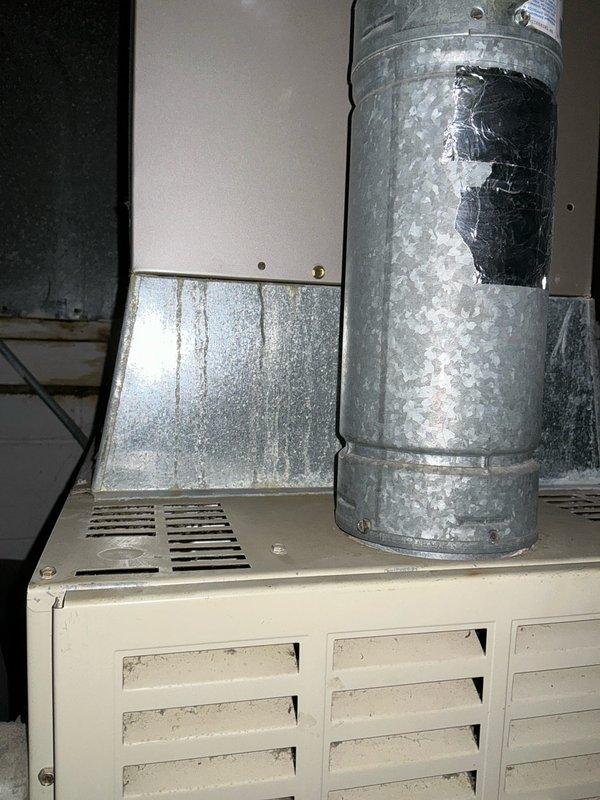 Completed inspection of a 20-year-old gas furnace in owner-occupied residence. System shows significant wear with patched ductwork and aging connections. Recommended full replacement of the existing unit due to age and condition, with quote provided for new high-efficiency system.