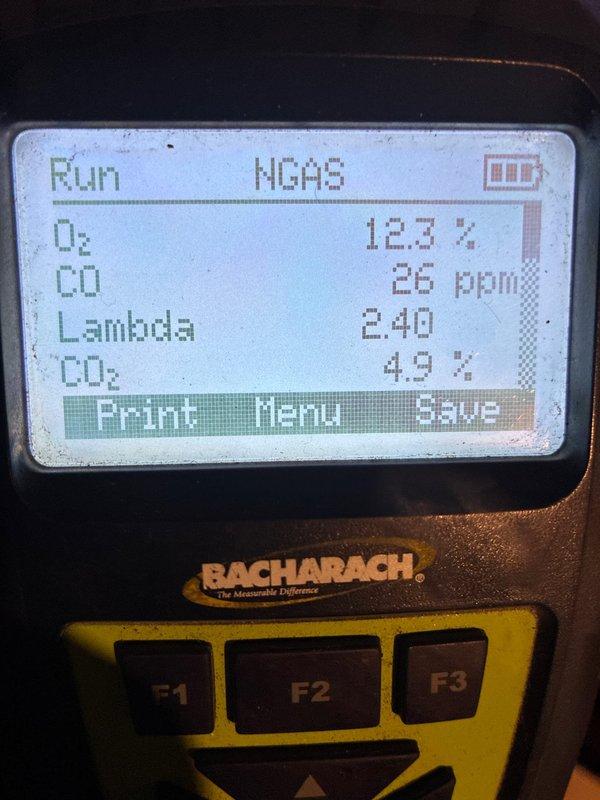 Performed scheduled maintenance on 5+ year old propane furnace (MVP Heating system). Inspected unit components, noting some dust accumulation and surface corrosion on internal components. Conducted combustion analysis with Bacharach analyzer showing acceptable readings (O₂: 12.3%, CO: 26ppm, CO₂: 4.9%, Lambda: 2.40), confirming proper operation of heating system.
