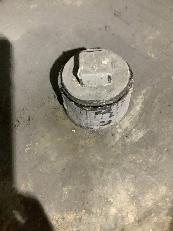 Responded to service call for a main drain backup in basement. Successfully snaked the main drain cleanout, clearing the blockage and restoring proper drainage. Documented condition of the cleanout access point and interior pipe threading which showed signs of sediment buildup and residue.