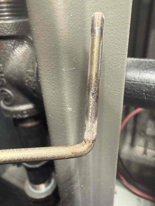 Performed scheduled heating maintenance on 5-year-old system. Inspected ventilation components including heat exchanger fins and found moderate dust accumulation requiring cleaning. Examined copper refrigerant lines and connections for proper installation and signs of wear; all connections secure with no leaks detected.