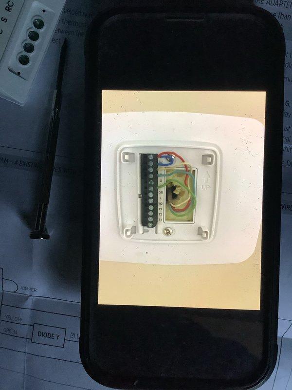 Diagnosed faulty thermostat connections by inspecting internal wiring and terminal connections. Identified and repaired corrosion issues on copper refrigerant lines at the evaporator coil, restoring proper system operation and cooling function.