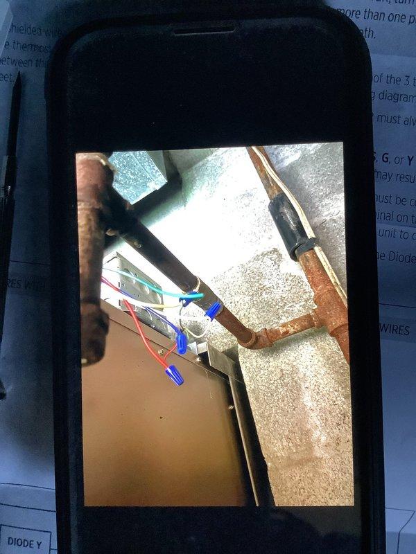 Diagnosed faulty thermostat connections by inspecting internal wiring and terminal connections. Identified and repaired corrosion issues on copper refrigerant lines at the evaporator coil, restoring proper system operation and cooling function.
