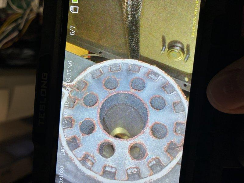 Performed scheduled MVP heating maintenance service. Inspected burner assembly and heat exchanger, noting minor corrosion on burner plate requiring monitoring. Used hex key to adjust and tighten components as needed for optimal system performance.