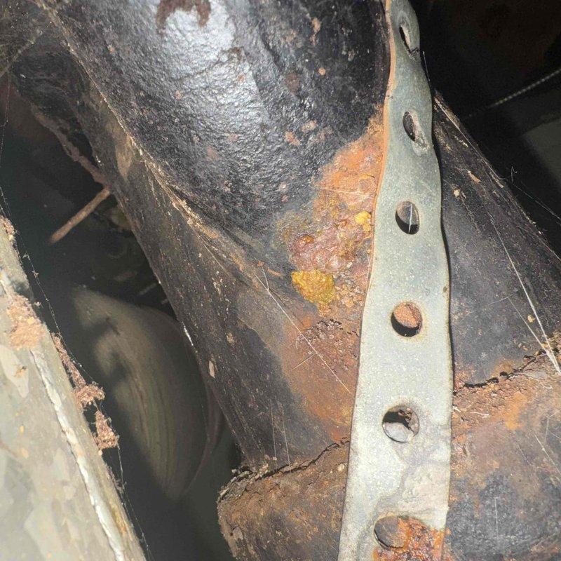 Performed scheduled furnace tune-up and inspection. Identified severe rust and corrosion on mounting bracket and mechanical components. Examined control board which showed normal operation with no visible damage to terminals, resistors, and capacitor.