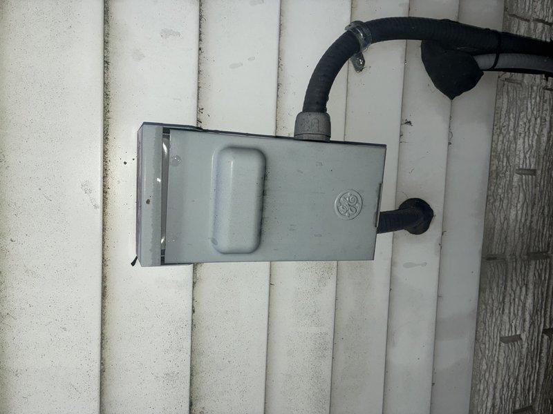 Performed standard cooling maintenance service on Lennox AC unit. Inspected outdoor condenser, electrical disconnect box, refrigerant lines, and drainage system. All components functioning properly with no issues detected.