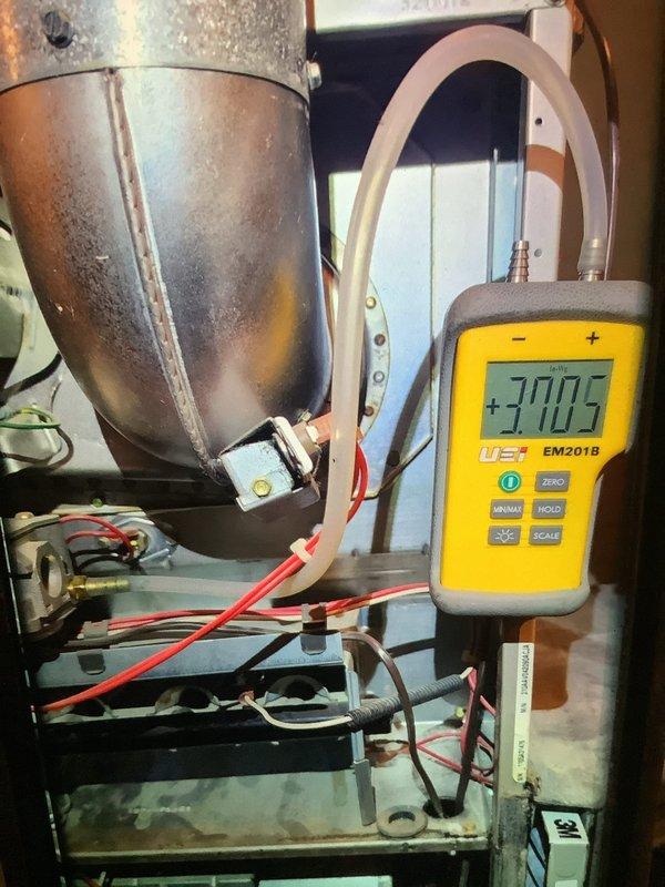 Completed routine MVP Heating service with comprehensive system diagnostics. Performed pressure/airflow testing using EM201B measurement device on the ductwork system, with readings registering at +300.5. Inspected and evaluated sensor components to ensure proper system functionality.