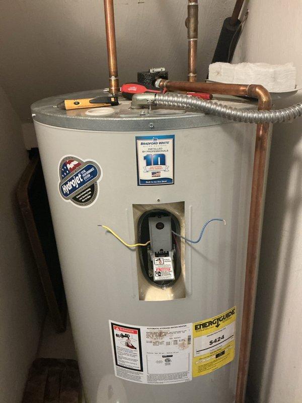 Responded to service call for Bradford White water heater not heating properly. Diagnosed failed anode rod showing severe corrosion and deterioration. Replaced anode rod and performed system check to verify proper operation and water temperature recovery.