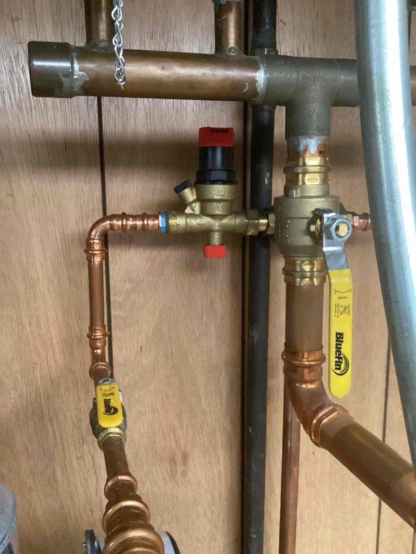 Responded to service call for a two-year-old steam boiler that failed to restart after a power outage. Inspected the Weil-McLain ECO 007e high-efficiency circulator pump and associated copper piping system with brass and ball valves. Restored proper operation by resetting the control system and verifying all safety switches were properly engaged following the power interruption.