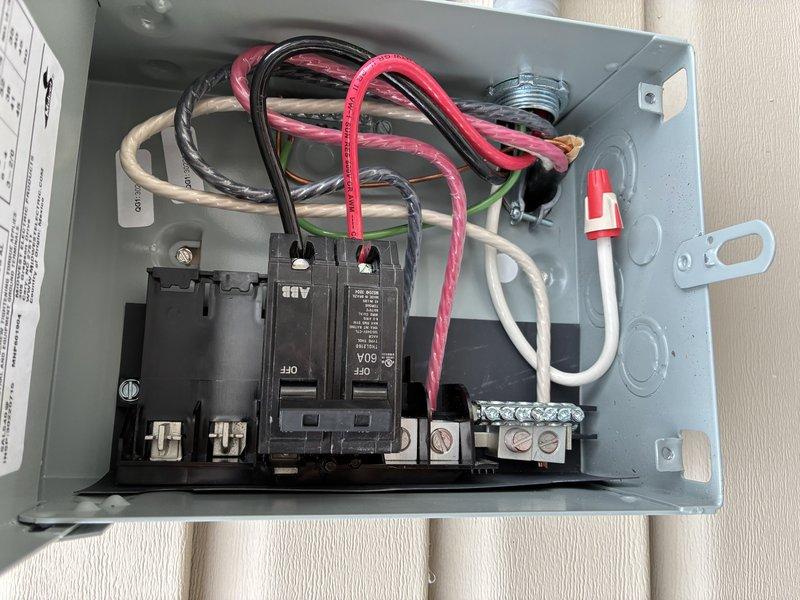 Diagnosed and repaired electrical issue with hot tub circuit that was tripping the breaker. Inspected outdoor emergency shutoff panel, verified proper connections at the 50A circuit breaker, and ensured all wiring (including ground) was correctly terminated. System now functioning properly without overload issues.