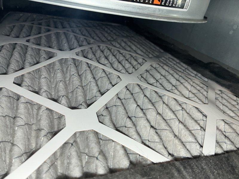 Performed scheduled MVP heating maintenance service. Inspected HVAC system including ductwork, piping infrastructure, and connections in utility space. Examined and confirmed proper installation of pleated air filter in furnace housing with no visible damage or deterioration to system components.
