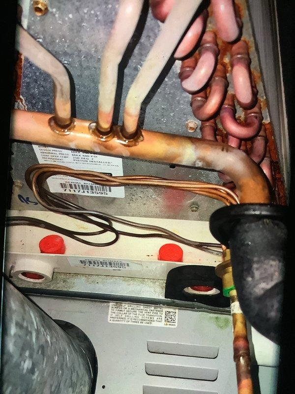 Completed sold repair on heating system. Replaced air filter and broken flame sensor, confirmed proper gas pressure, flushed drains, and performed combustion test with passing results. Noted hot spots on igniter and recommended blower motor capacitor replacement due to low tolerance testing, as well as evaporator/blower wheel cleaning and drain tablets for system maintenance.