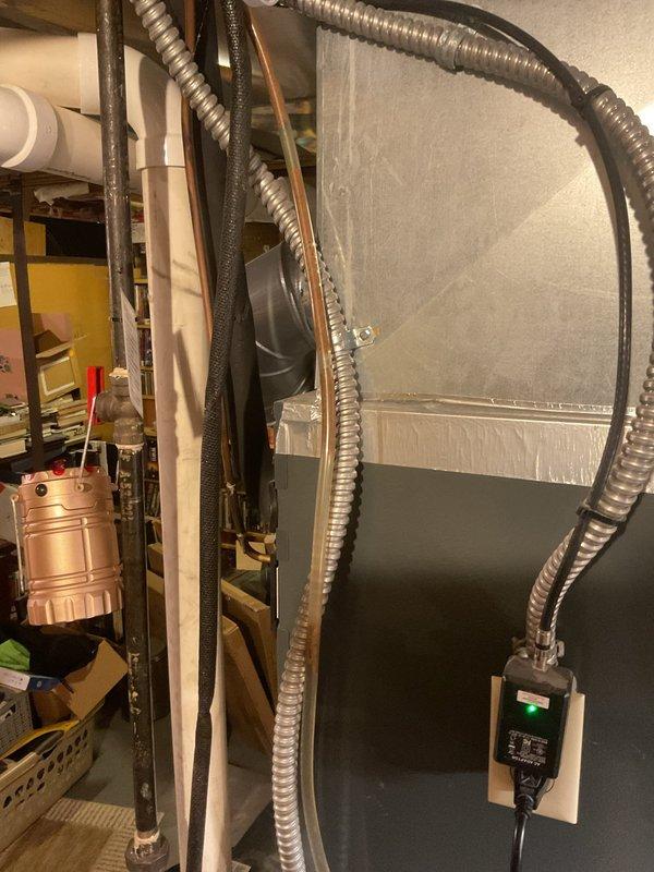 Responded to service call for 2-year-old humidifier leaking. Upon inspection of the unit in the basement utility area, identified water seepage around connection points. Replaced deteriorated gaskets and tightened all fittings to resolve the leak. System tested and confirmed proper operation with no further moisture issues.