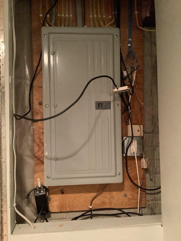 Performed diagnostic inspection of electrical system to address customer-reported issues with non-functioning outlets and flickering lights. Examined main electrical panel, confirming proper connections and identifying circuit issues. Replaced faulty three-gang switch plate that was contributing to the lighting inconsistencies, restoring proper functionality to the affected fixtures and outlets.
